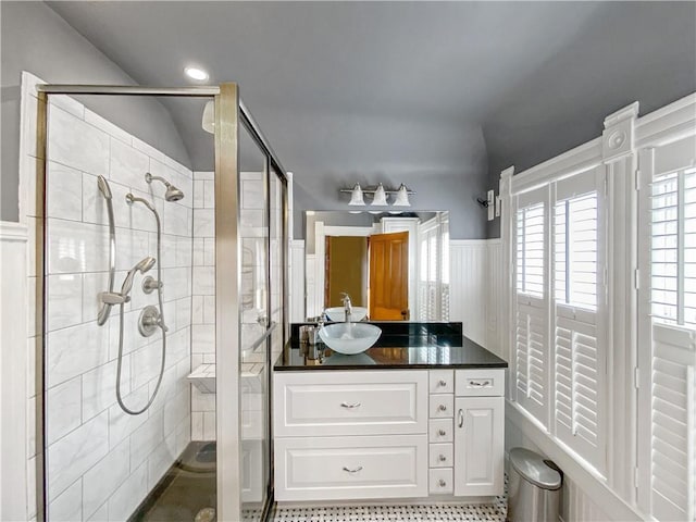 bathroom featuring vanity and walk in shower