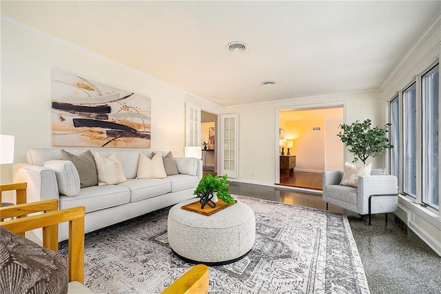 living room featuring crown molding