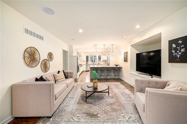 living room with hardwood / wood-style flooring