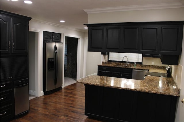 kitchen featuring stone counters, dark hardwood / wood-style floors, sink, stainless steel appliances, and crown molding