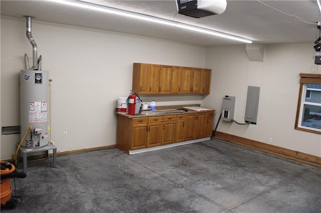 garage with a garage door opener, electric panel, sink, and gas water heater