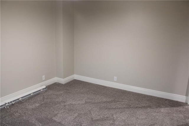 unfurnished room featuring carpet flooring