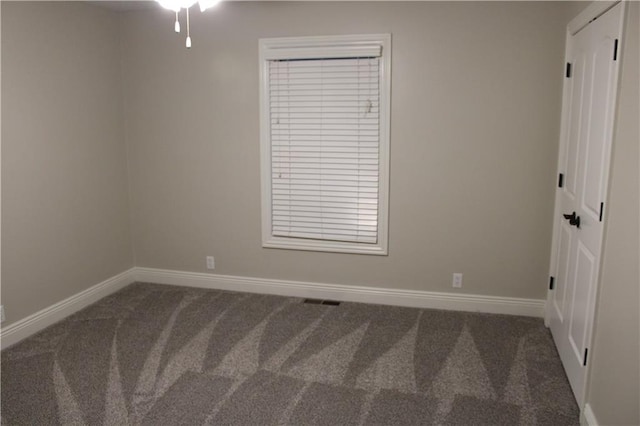 view of carpeted spare room