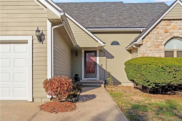 property entrance with a garage