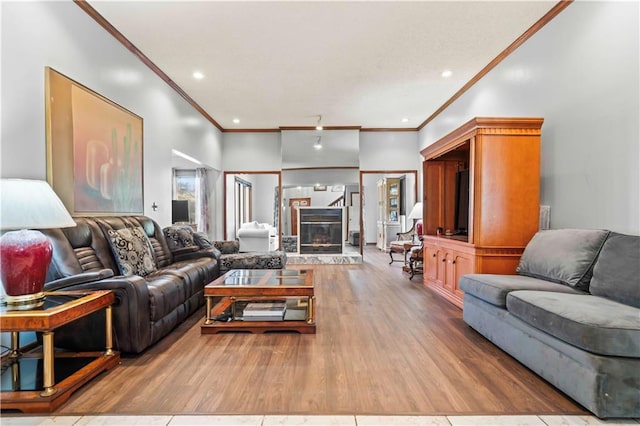 living room with ornamental molding