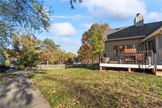 view of yard featuring a wooden deck