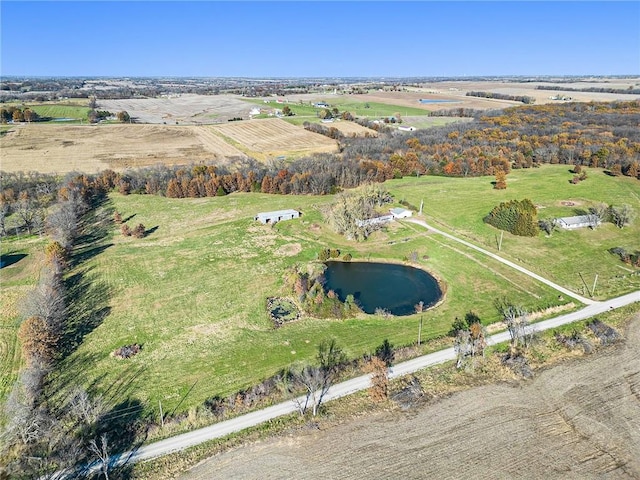 bird's eye view featuring a rural view and a water view