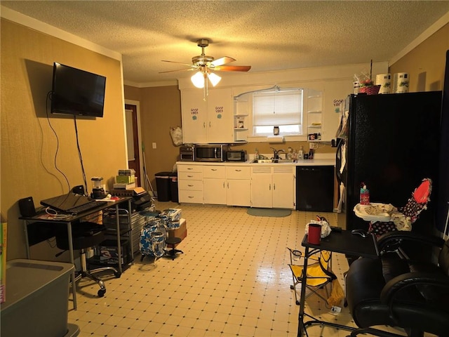 kitchen with black appliances, crown molding, sink, ceiling fan, and white cabinetry