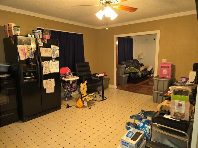 interior space featuring ceiling fan, a textured ceiling, and ornamental molding