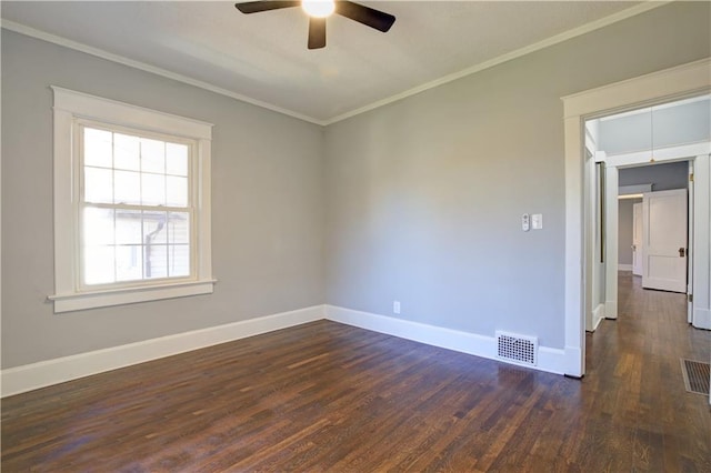 empty room with crown molding, ceiling fan, and dark wood-type flooring