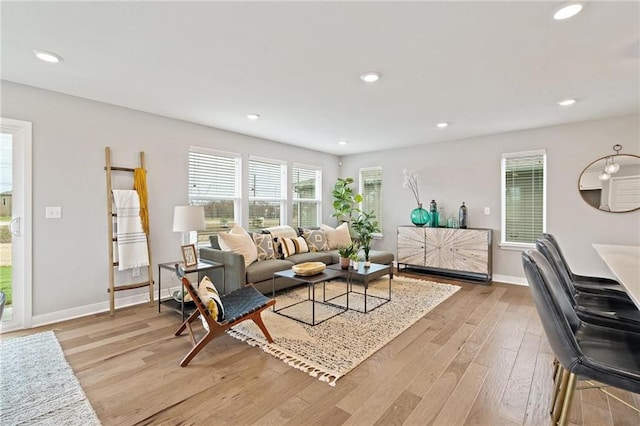 living room with light hardwood / wood-style flooring