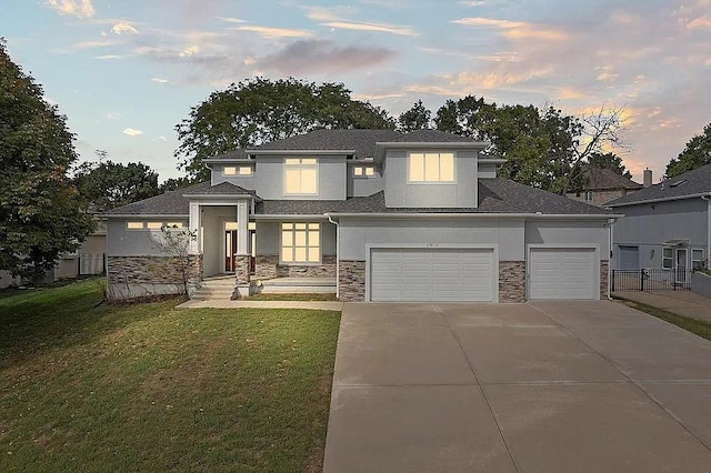 prairie-style house featuring a lawn