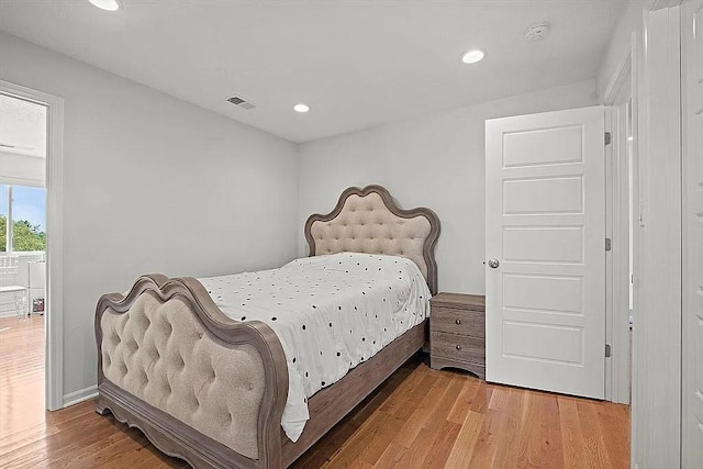 bedroom featuring light hardwood / wood-style flooring