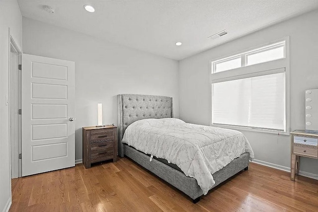 bedroom featuring hardwood / wood-style flooring