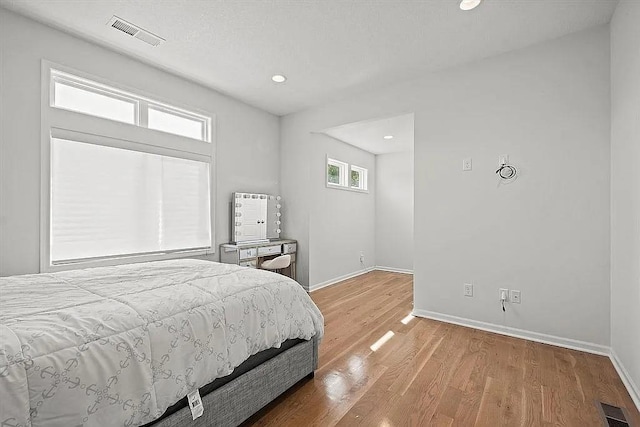 bedroom featuring light hardwood / wood-style flooring