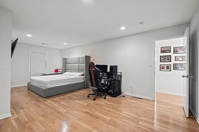 bedroom featuring light hardwood / wood-style flooring