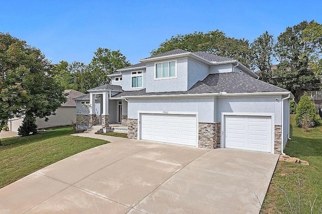 prairie-style home featuring stucco siding, stone siding, and a front lawn