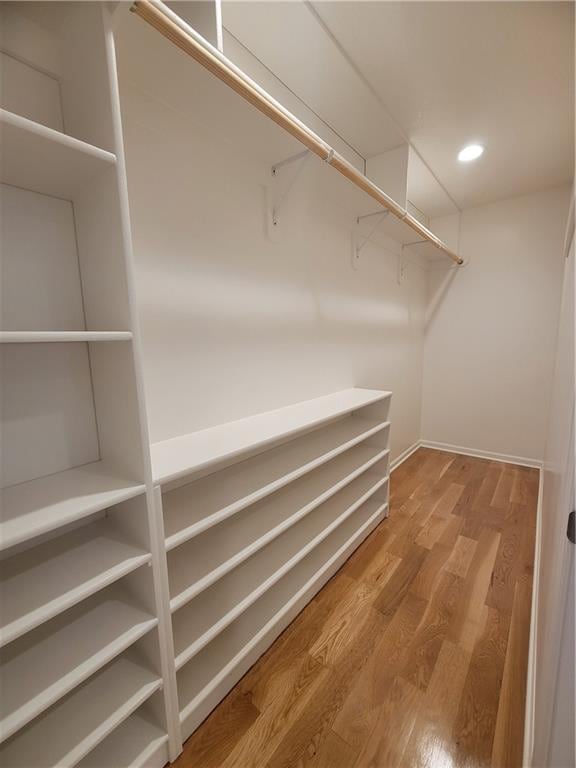 17012 E 38th Ter S, Independence, MO 64055 - walk in closet featuring wood finished floors