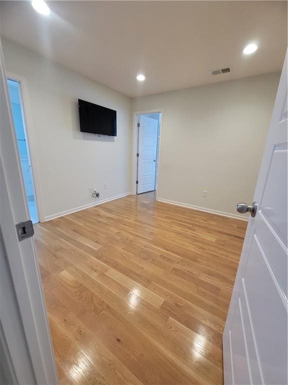 17012 E 38th Ter S, Independence, MO 64055 - spare room featuring light wood-type flooring and recessed lighting