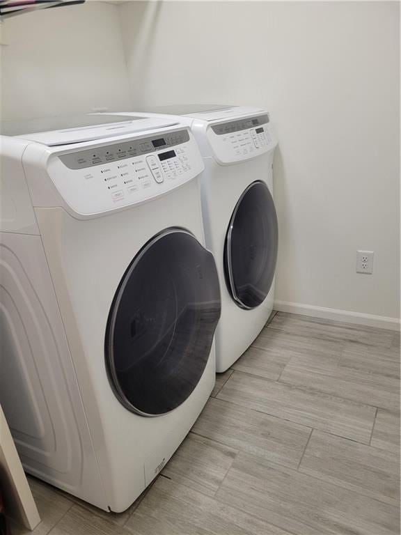 17012 E 38th Ter S, Independence, MO 64055 - laundry area featuring washer and dryer and baseboards