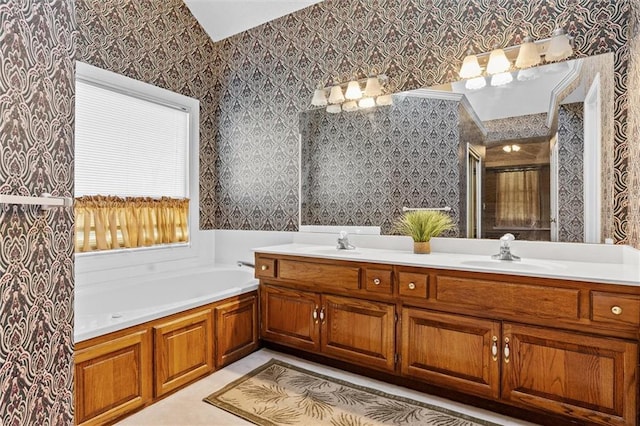 bathroom with vanity and a bathtub