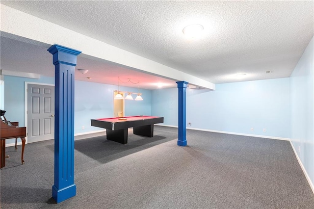 recreation room featuring ornate columns, a textured ceiling, carpet, and baseboards