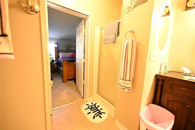 bathroom with vanity and walk in shower