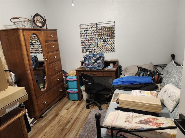 bedroom featuring light wood-type flooring