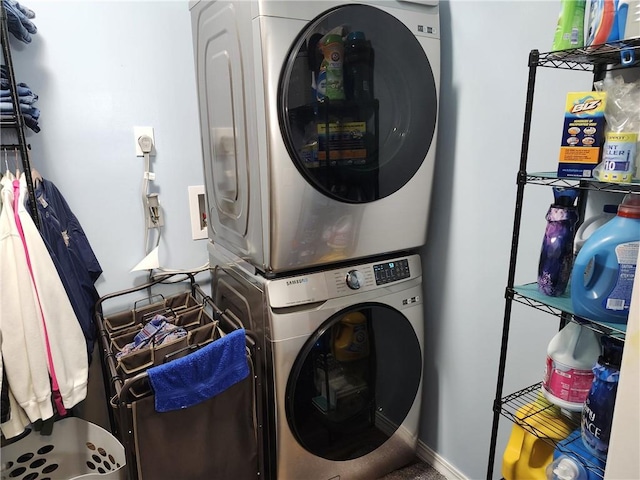 laundry room featuring stacked washing maching and dryer