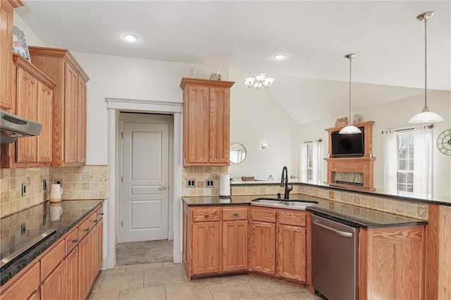 kitchen featuring backsplash, stainless steel dishwasher, sink, hanging light fixtures, and lofted ceiling