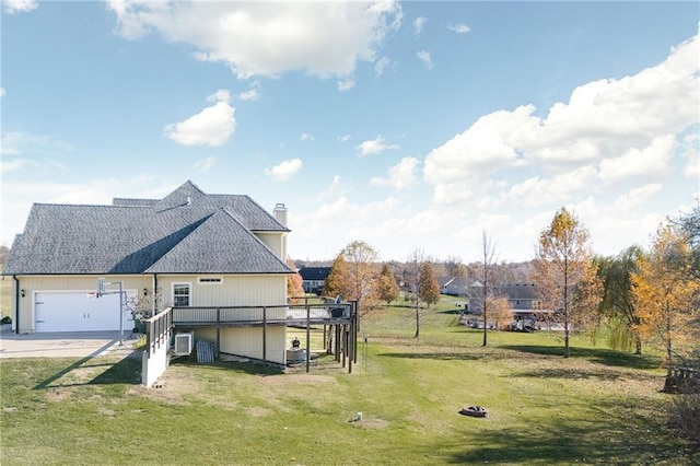 exterior space featuring a yard and a deck