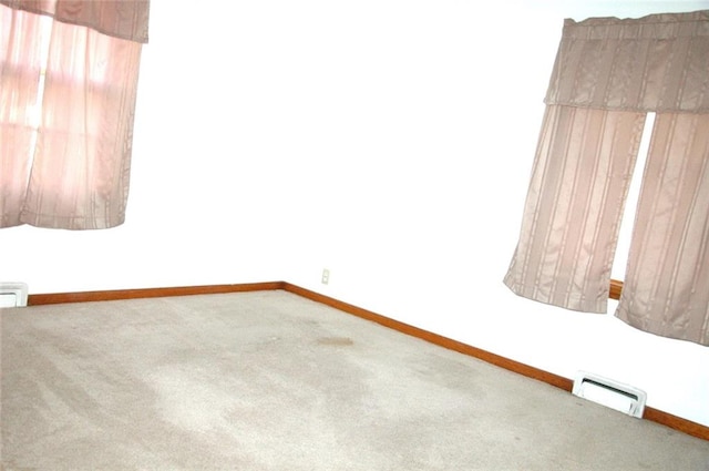 unfurnished room with carpet