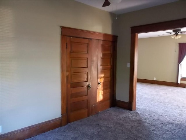 interior space featuring ceiling fan