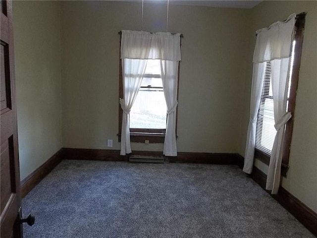 view of carpeted spare room