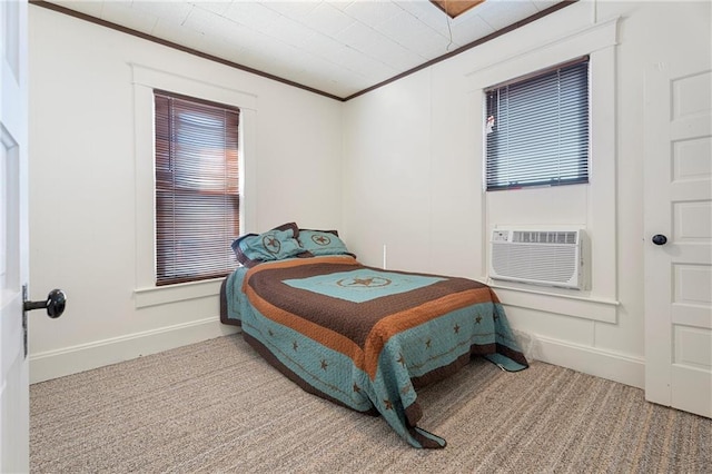 carpeted bedroom with crown molding