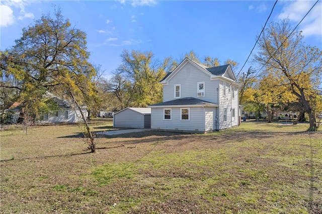 view of side of property with a lawn