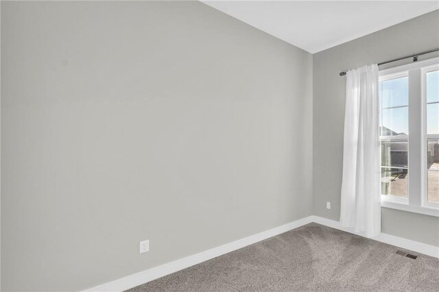 view of carpeted spare room