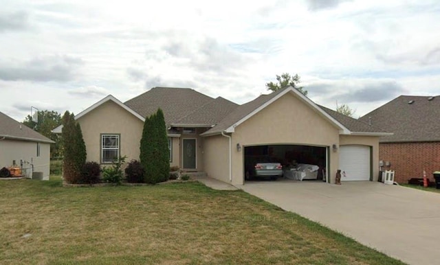 ranch-style home with a front yard, a garage, driveway, and stucco siding