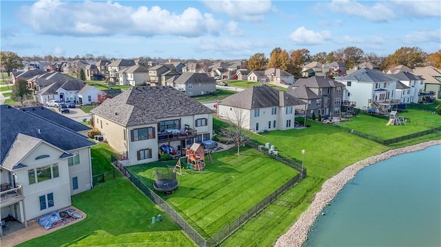 drone / aerial view with a water view