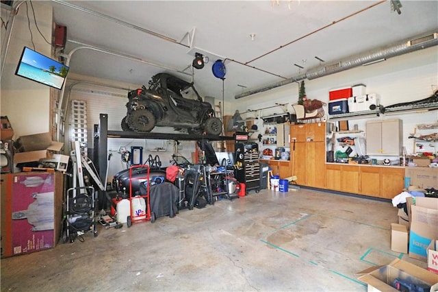 garage with a workshop area