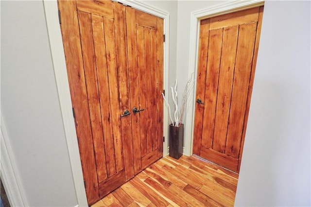 doorway to outside with light hardwood / wood-style floors