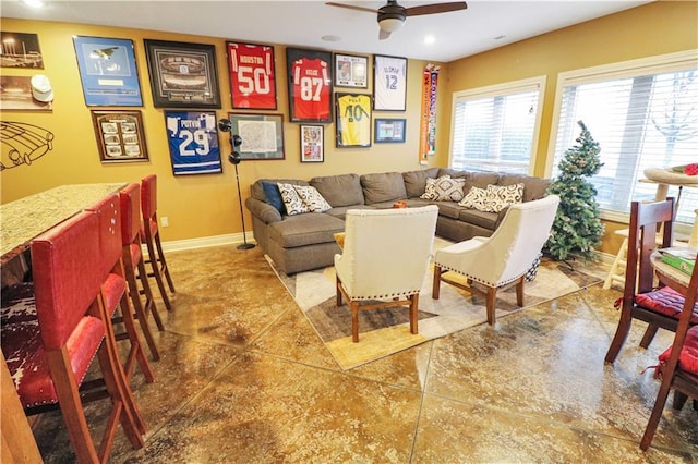 living room featuring tile patterned floors and ceiling fan