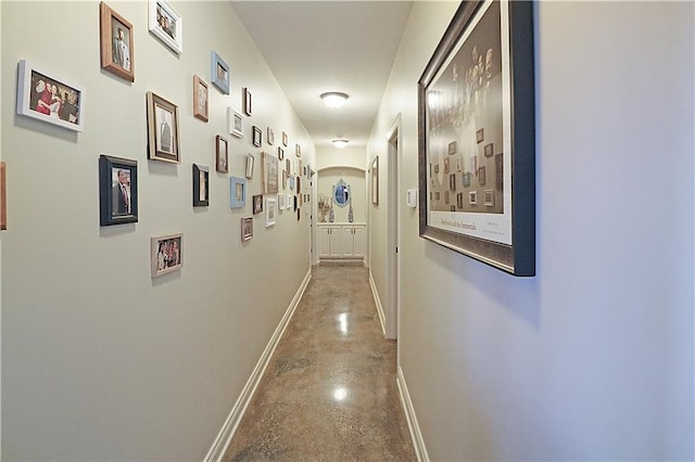 corridor with concrete floors