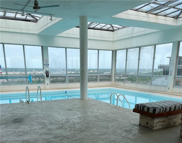 view of pool with ceiling fan