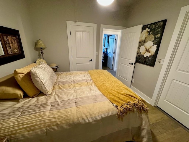 bedroom featuring hardwood / wood-style floors