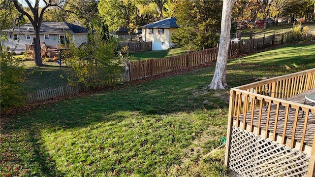 view of yard featuring a wooden deck