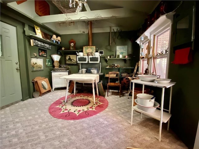 miscellaneous room with carpet floors