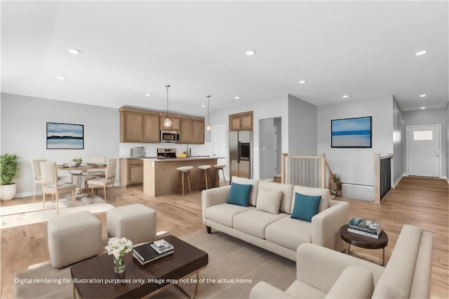 4421 SW Grindstone Cir, Lees Summit, MO 64082 - living room featuring recessed lighting, light wood-type flooring, and baseboards