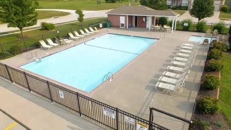 4420 SW Grindstone Cir, Lees Summit, MO 64082 - community pool with a patio area