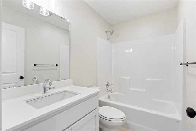 full bathroom featuring shower / tub combination, toilet, and vanity